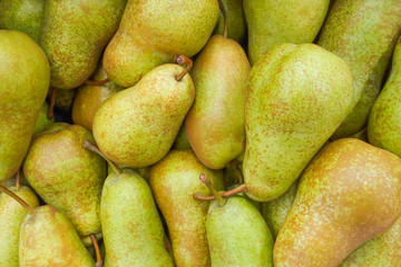 A pile of Conference pears as background, texture