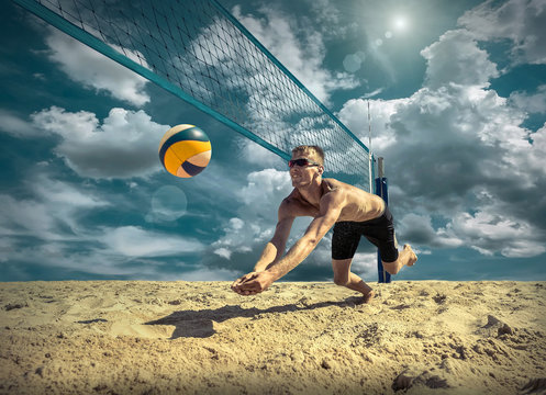 Beach Volleyball player in sunglasses under sunlight. Dynamic sp