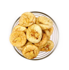 Dry figs isolated in glass bowl on white background, top view