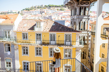 View on the old buildings with famous saint Justa metal lift during the sunny weather in Lisbon city, Portugal