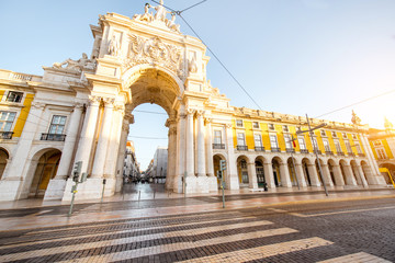 View on the Triumphal arch on the Commerce square during the sunrise in Lisbon city, Portugal