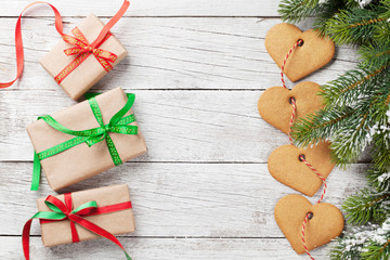 Christmas gift boxes, fir tree and cookies