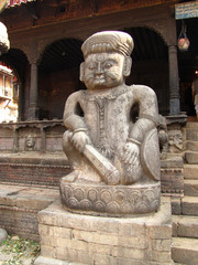 stone sculpture of the ancient war in Kathmandu in Nepal in the square