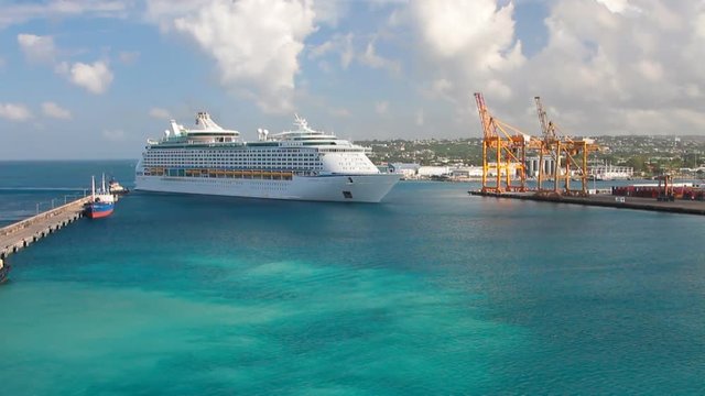 Cruise liner enters in port water area. Bridgetown, Barbados