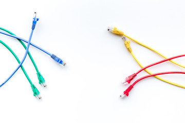 Colored patch-cord on white background top view
