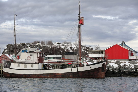 Old wooden fishing boat moored in the port-Laukvik-Vagan kommune-Austvagoya-Lofoten-Norway. 0630
