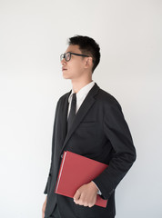 Portrait of happy smiling businessman, white background.