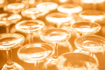 Group of empty wine glass upside down in row sepia tone