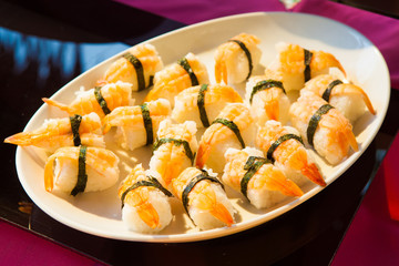 Shrimp sushi with seaweed Japanese cuisine on white plate