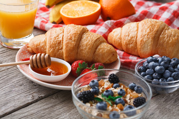 Fresh crusty croissants and orange juice for morning meals