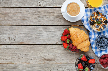 Tasty pastry, fruits and berries on rustic wood, top view