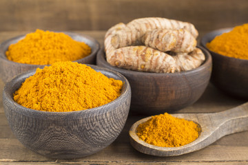 Roots and turmeric powder - Curcuma longa