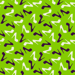 Pattern of women shoes on the green background. 