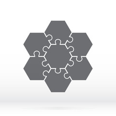 Simple icon hexagonal puzzles in gray. Simple icon puzzle of the seven elements. Flat design. Vector illustration EPS10.