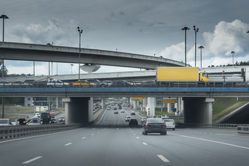 Underside of an elevated roads. Cars overpass and viaducts