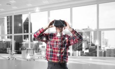 Fototapeta premium Guy wearing checked shirt and virtual mask demonstrating some emotions