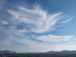 Fototapeta na wymiar blue cloudy sky background and mountain