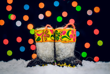 Russian valenki on the Christmas lights