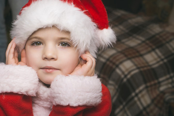 Santa claus kid at Christmas.