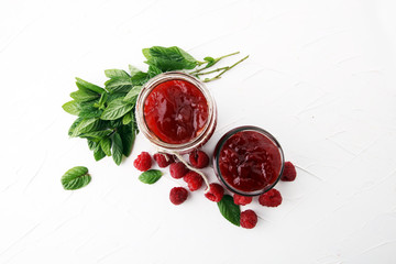 Fresh raspberry jam with toast or bread for breakfast