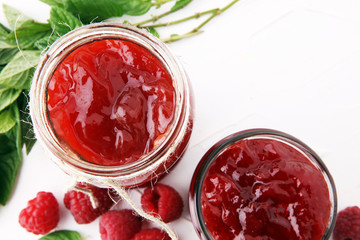 Fresh raspberry jam with toast or bread for breakfast