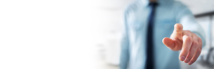 Panorama view of businessman pointing finger