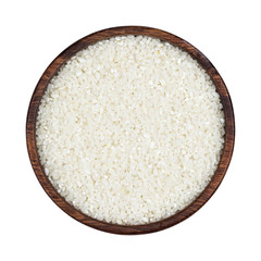 Fototapeta na wymiar Small crushed rice in wooden bowl isolated on white background. Top view