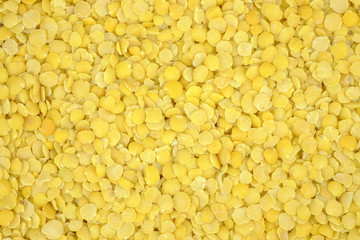 Macro of yellow lentils.