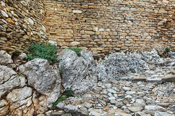 Old slope and wall in the French village of Saint Montan