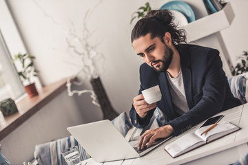 Stylish guy working