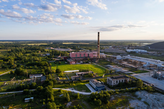 Aerial view Oil refinery with a background of mountains and sky at sunset. Aerial photography. Kohtla-J&auml;rve city, Estonia, Ida-Virumaa.