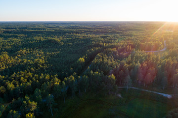 Aerial View. Flying over the beautiful summer rivers at sunset.