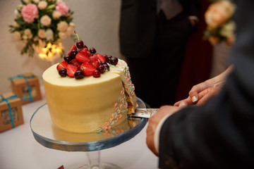 Wedding cake cut, sweets for bride, groom and guests