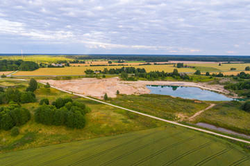 Aerial view of amazing summer landscape. Fields and meadows from above.