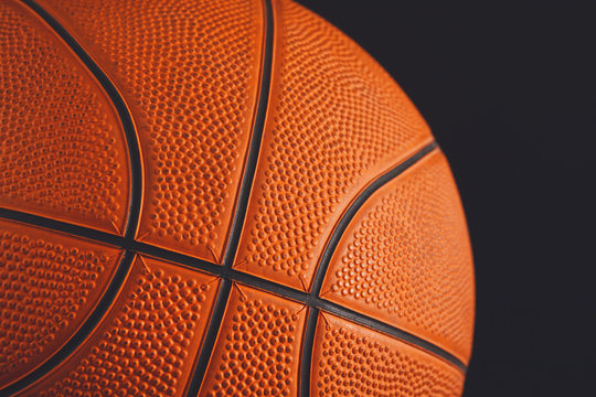 Basketball ball on black background closeup