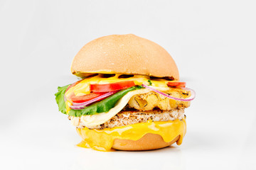 Burger With Beef, Tomato, Cheese, Lettuce and Onion. Close up. On white background.