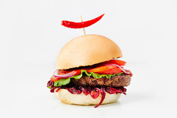 Burger With Beef, Tomato, Cheese, Lettuce and Onion. Close up. On white background.