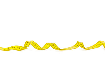 yellow metric measuring tape isolated on white panorama background