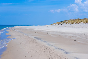 Fototapeta na wymiar Wide sandy beach in Slowinski National Park over Baltic Sea in Poland