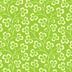 Clover leaves seamless vector pattern. St. Patrick's Day green background. Shamrock wallpaper