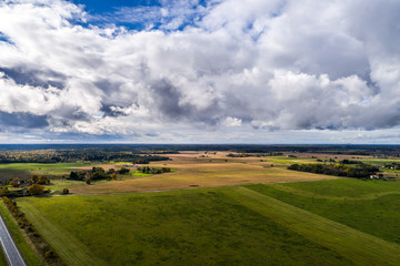 Obraz premium Aerial view of amazing summer landscape. Fields and meadows from above.