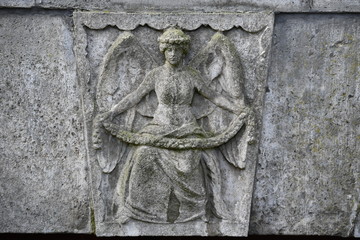 Old stone sculpture on a graveyard