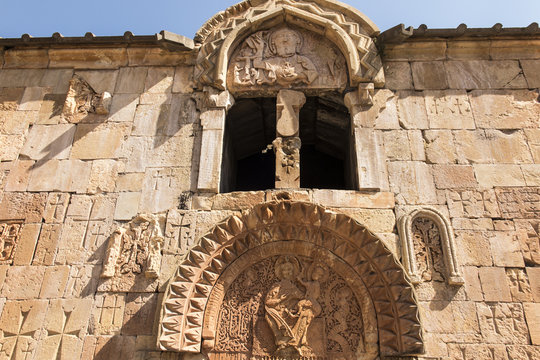 Armenia, the monastery of Noravank. The central entrance to the church of John the Baptist with a unique bas-relief depicting God the Father.