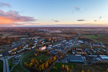 Aerial view of the city at sunset. Beautiful autumn city landscape.