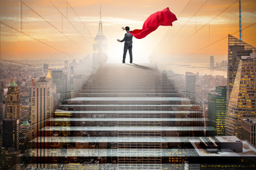 Businessman superhero pressing virtual buttons on career ladder