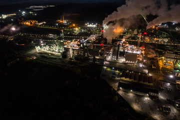 Fototapeta na wymiar Aerial view of oil refinery. Industrial view at oil refinery plants with lots of light at night. 