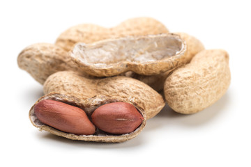 Roasted peanuts isolated on white