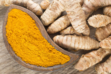 Roots and turmeric powder - Curcuma longa