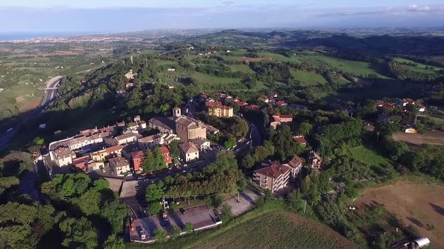 Italia, Pesaro Giugno 2017 - vista aerea del bordo mediavale di Novilara in provincia di Pesaro. Il borgo &egrave; immerso nel verde dei campi e a  pochi passi dal mare