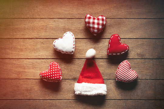 Santa Claus hat and heart shape toys